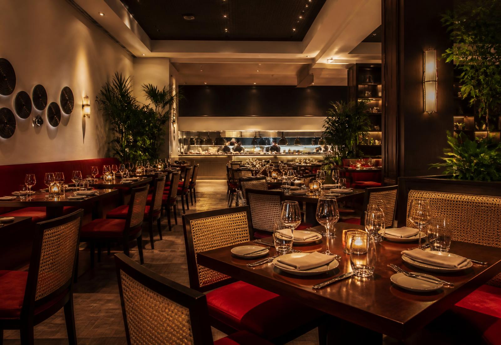 Warmly lit Sankofa Table dining room